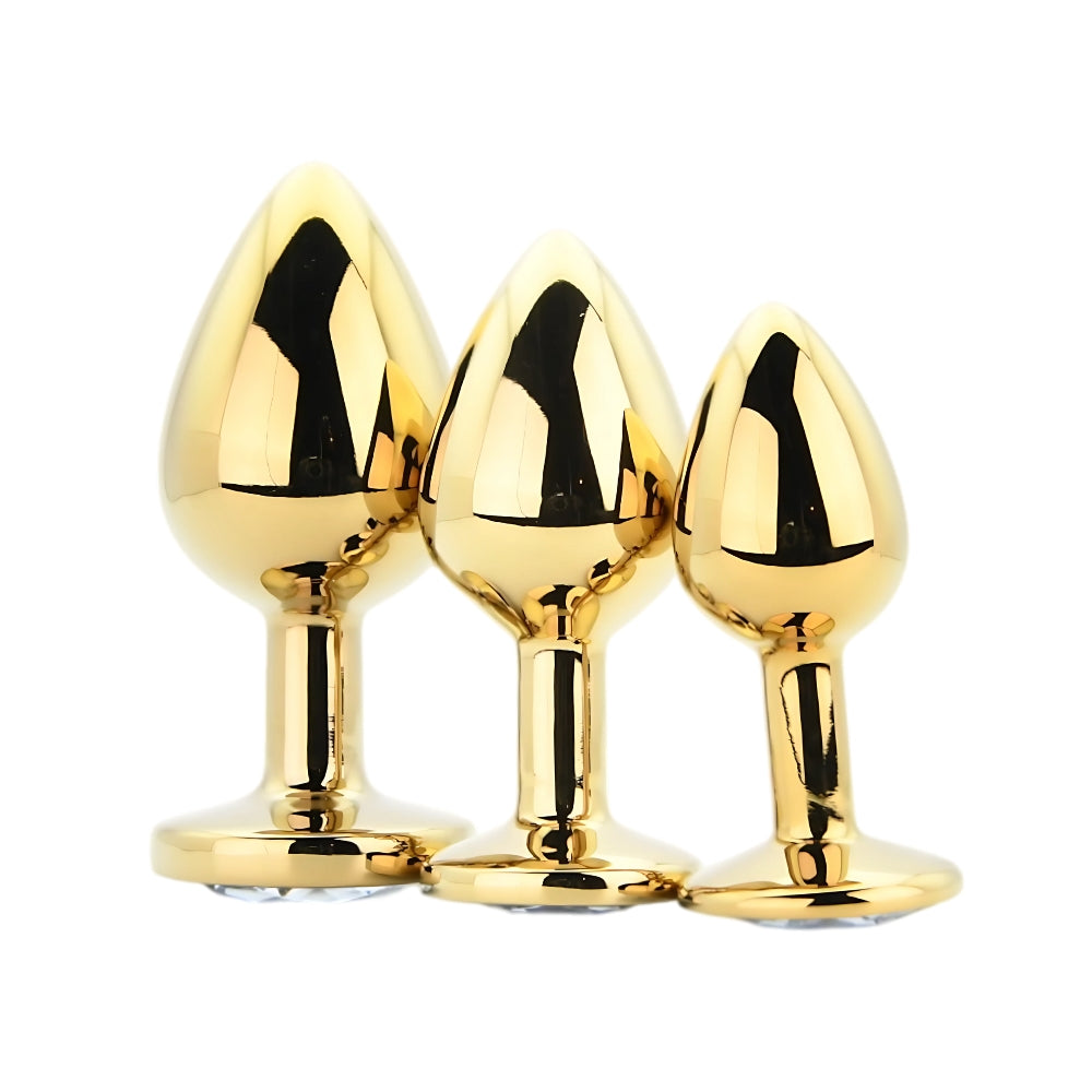 Toosh Metall-Analplug-Set Gold mit 3 Stück und klaren Steinen