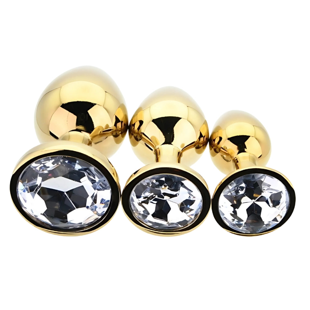 Toosh Metall-Analplug-Set Gold mit 3 Stück und klaren Steinen