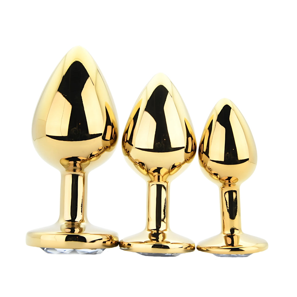 Toosh Metall-Analplug-Set Gold mit 3 Stück und klaren Steinen